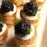 Produced for Italtouch, this Beluga Caviar from Baku boasts large and smooth pearls in shades ranging from light to dark grey with black pigments, and it possesses a flavor profile distinct from all other caviars. This delicious, sustainable caviar embodies the unique blend of rich Azerbaijani caviar production traditions and modern technologies that Baku Caviar represents.