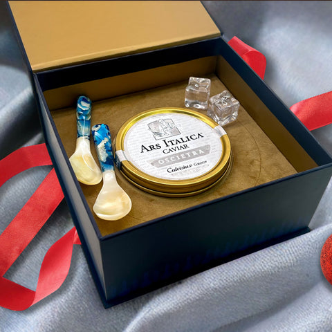 Discover the rich, nutty flavour of Ars Italica Oscietra Classic Caviar. This gift set includes 100g of premium caviar, two mother-of-pearl spoons, a caviar opener, and an elegant box. Perfect for connoisseurs, with delivery across Dubai and Abu Dhabi.

Ars Italica Oscietra Classic Caviar, caviar gift set, premium caviar, mother-of-pearl caviar spoons, caviar opener, gourmet caviar gift, sustainable caviar, caviar delivery Dubai