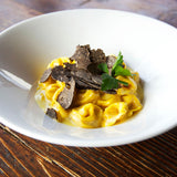 Fresh black winter truffle with rich, earthy texture, harvested in Périgord, France