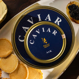 Premium Kaluga Hybrid caviar bundle with mother-of-pearl spoons, blinis and crème fraîche.