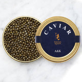 Kaluga Hybrid caviar derived from a hybrid of the Amur River sturgeons Kaluga (Huso dauricus) and Schrenke (Acipenser schrenckii). This exquisite caviar showcases grains that are truly spectacular in size, with colours ranging from vibrant gold to chocolate brown. 