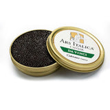 Open tin of Da Vinci Royal caviar displaying glossy dark brown pearls with smooth texture and medium size.