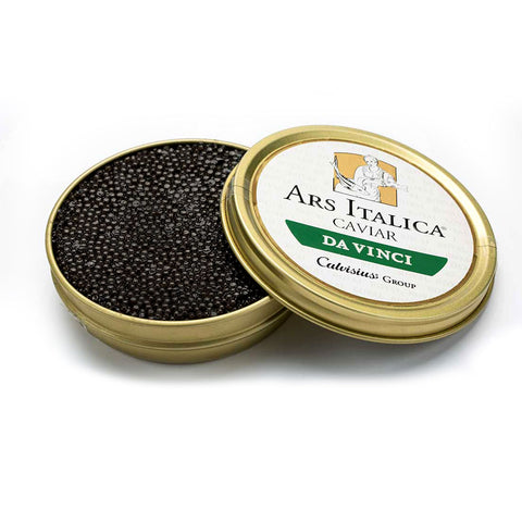 Open tin of Da Vinci Royal caviar displaying glossy dark brown pearls with smooth texture and medium size.