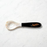 Classic Black: Handcrafted mother of pearl caviar spoon with a classic black handle, designed for elegant serving of premium caviar.