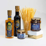 Italian gourmet gift set with truffle sauce, truffle carpaccio, egg tagliatelle, balsamic vinegar and extra virgin olive oil.